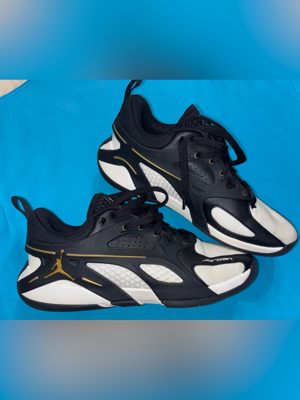 Jordan Men’s Black, White and Gold Low-Top Sneakers